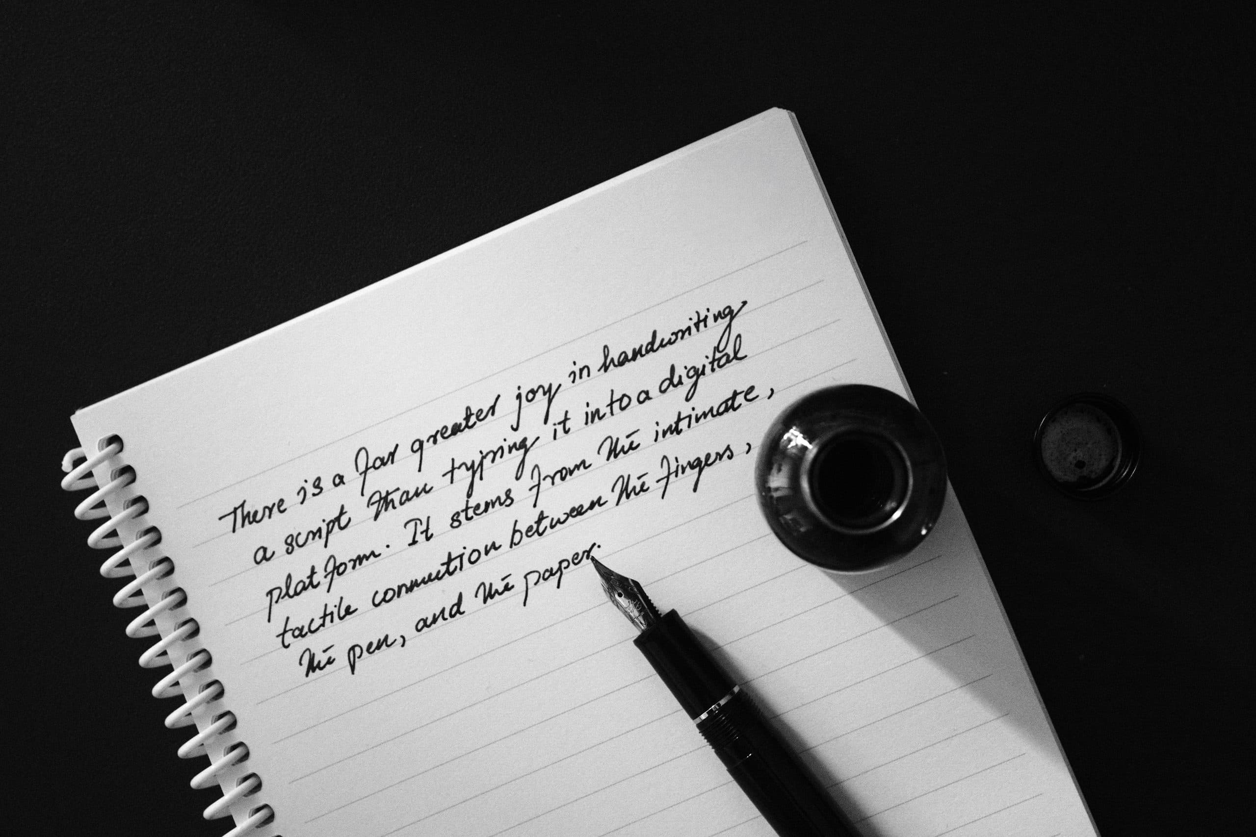 A handwritten journal page with an ink pen